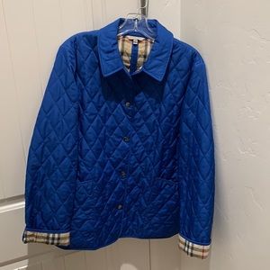 Burberry raincoat. Size medium.